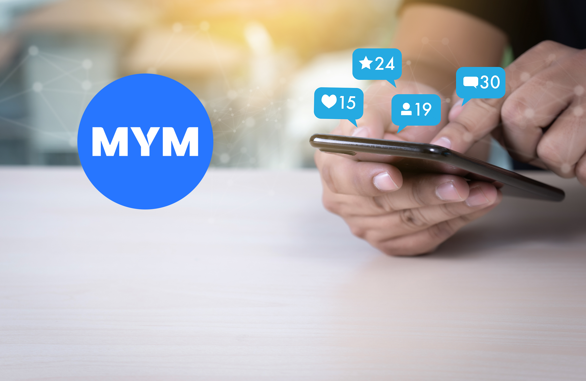 Person holding smartphone with MVM logo and floating social media notification icons showing various engagement metrics