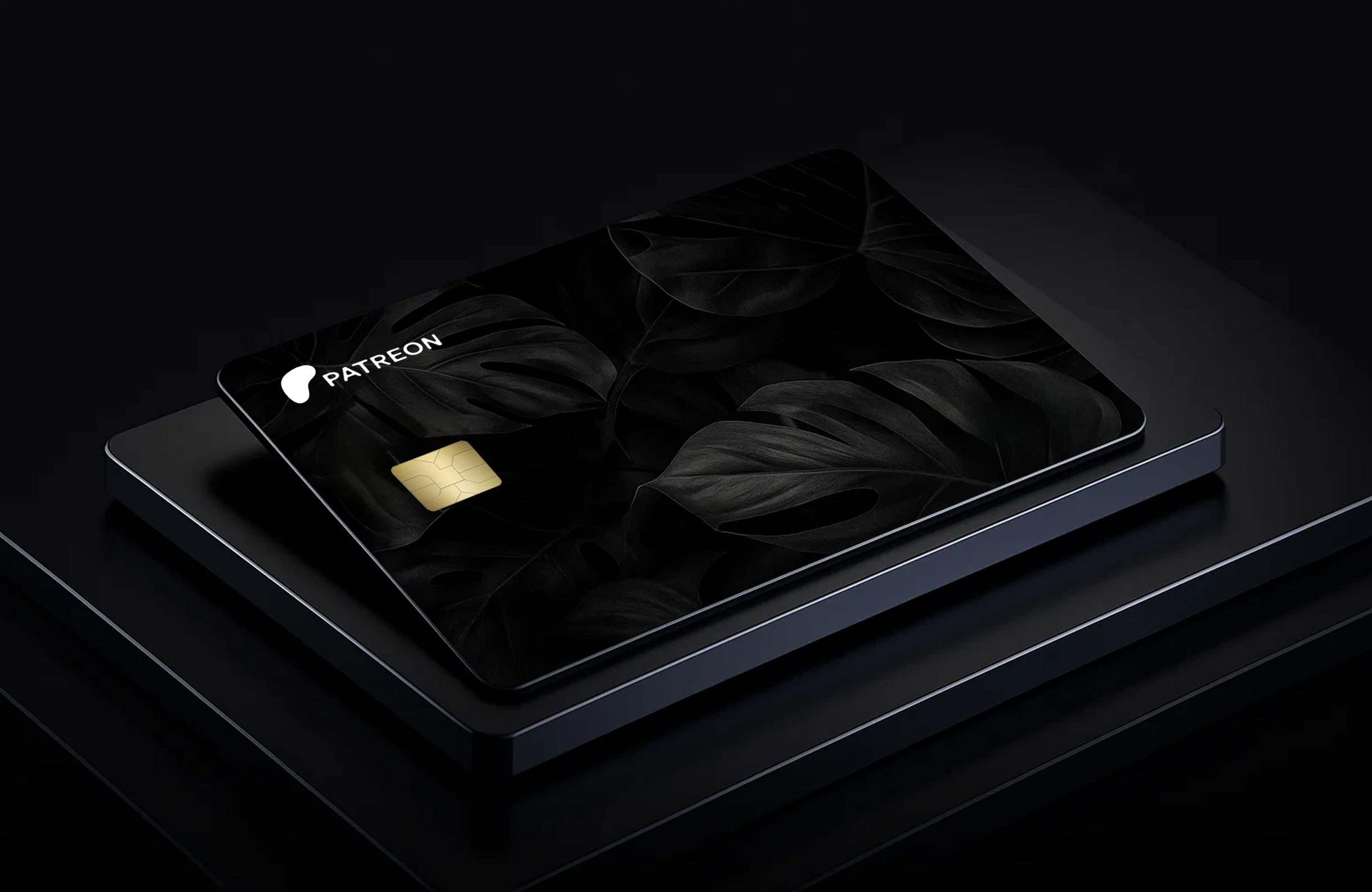 Black Patreon card with gold chip on dark background.